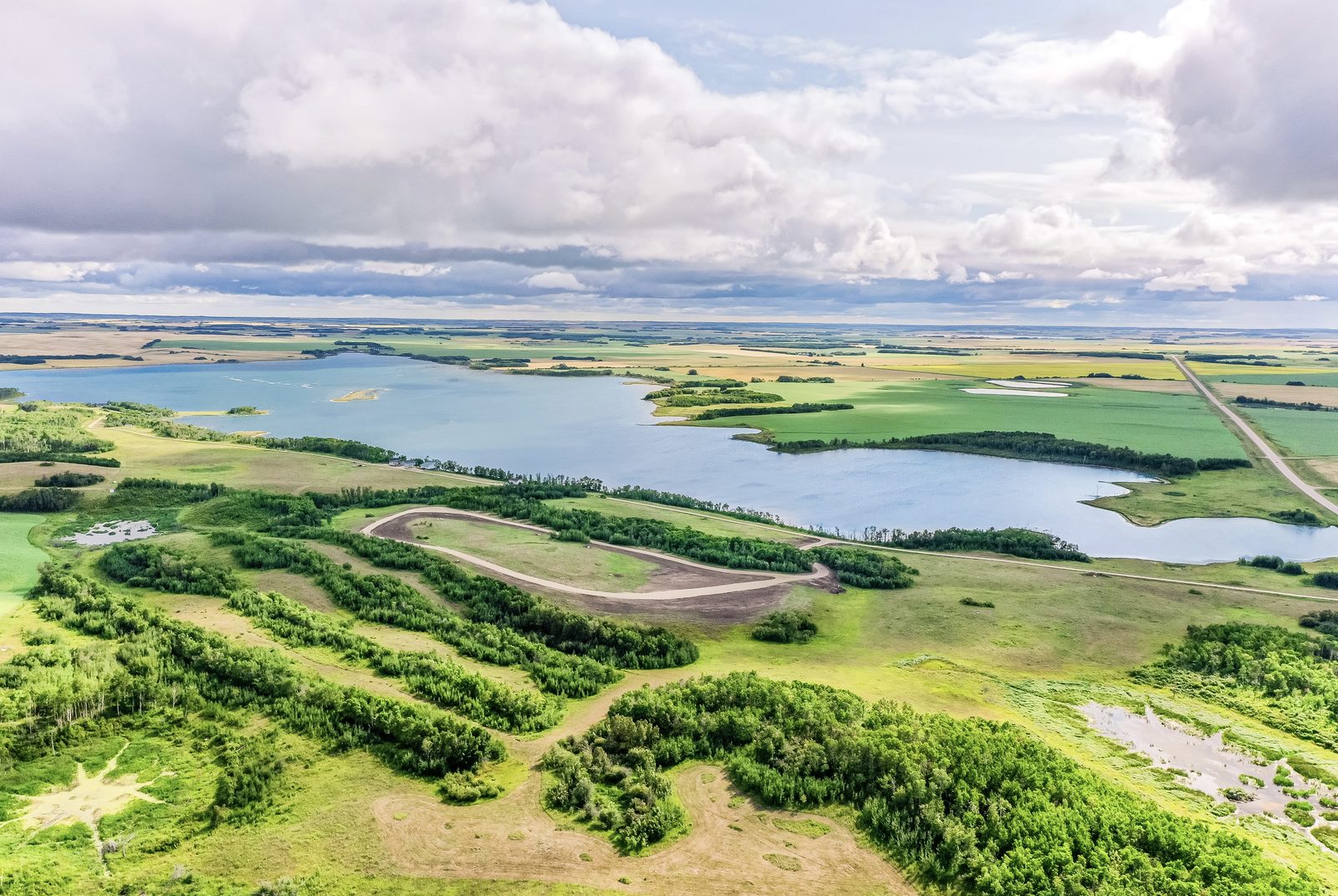 The peninsula from above — the RV park continuing to expand into the area sheltered by trees